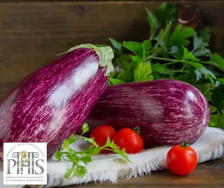 Fresh seasonal vegetables on a wooden table – a symbol of eco_conscious_cooking and sustainable private chef practices.