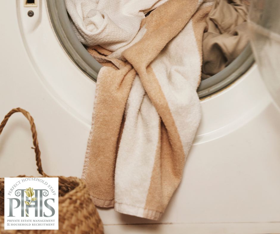 Running a washing machine with a full load as part of green laundry practices to maximise water and energy efficiency