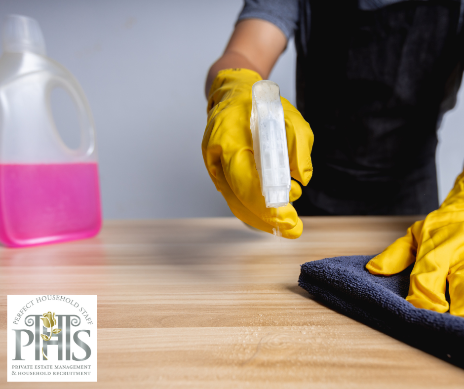 Housekeeper cleaning a room following safety tips for housekeepers to prevent injury