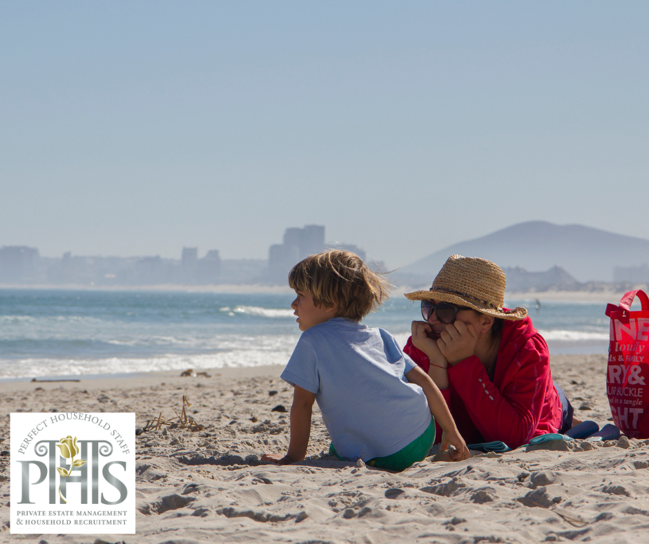 Nanny and child enjoying summer outdoors – ideal time to apply for a nanny job.
