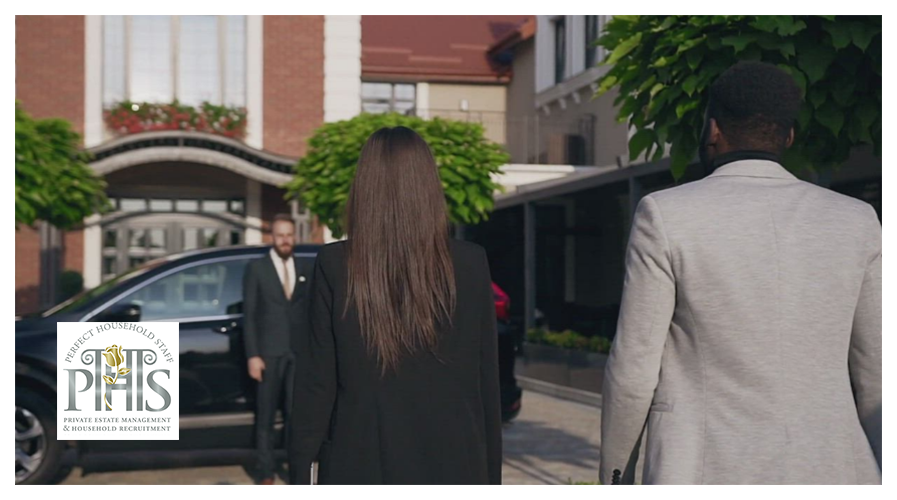 Surrey private chauffeur taking principals to vehicle