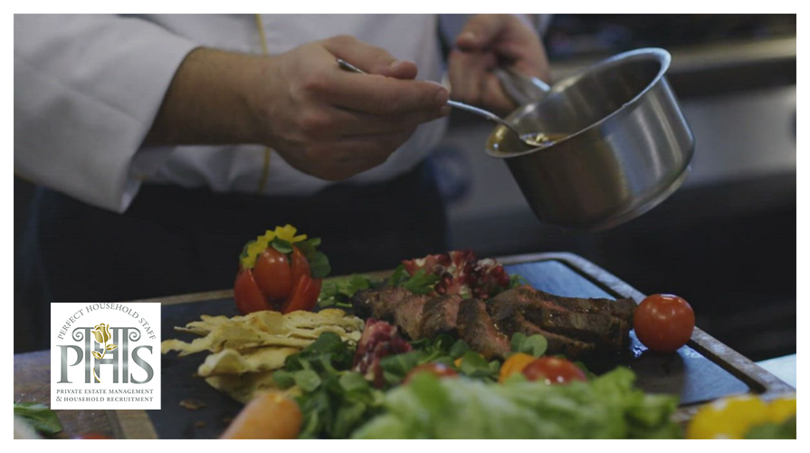 Skilled chef working in an elegant private household kitchen, highlighting private cook jobs Stafford with Perfect Household Staff.