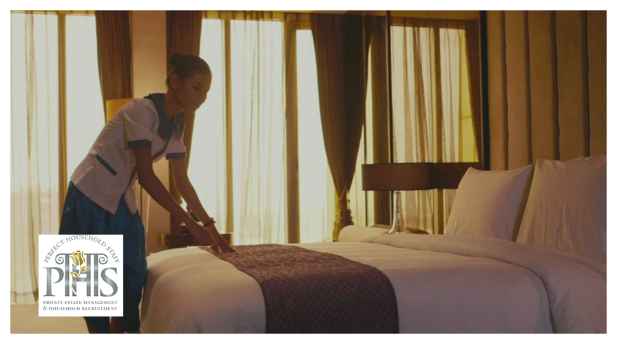 Housekeeper changing bed linen, typical of Tagalog housekeeper jobs Moseley