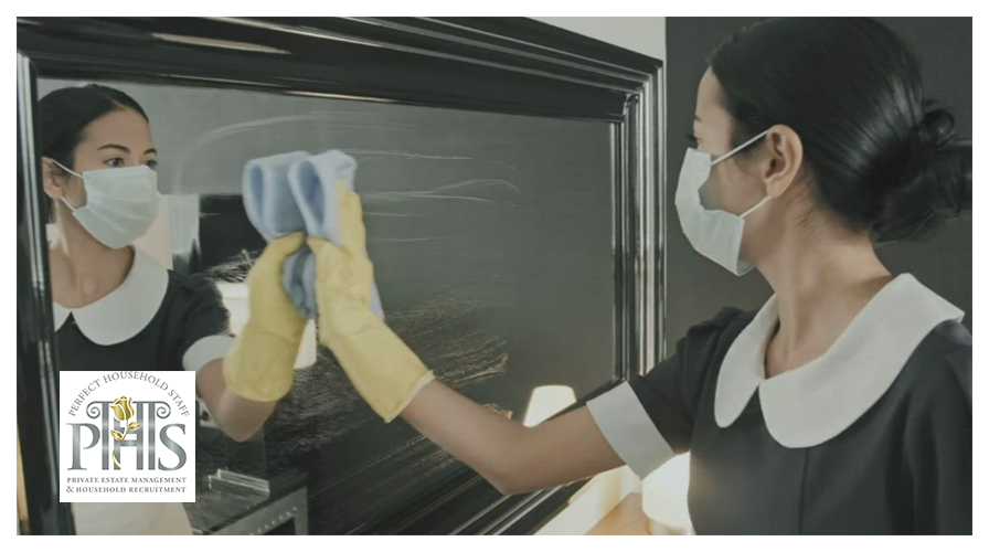 Private housekeeper arranging household supplies in an elegant Wilton property with high standards for Housekeeper jobs Wilton